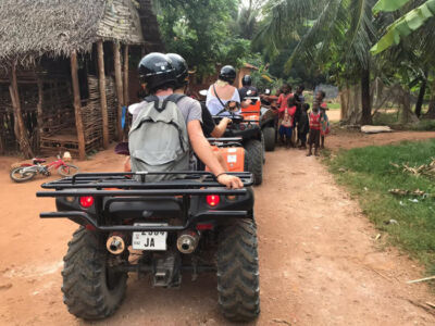 Quad biking through villages