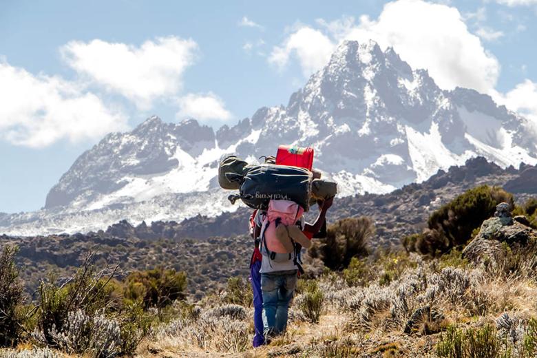 Trekkers on Lemosho route with Kilimanjaro behind